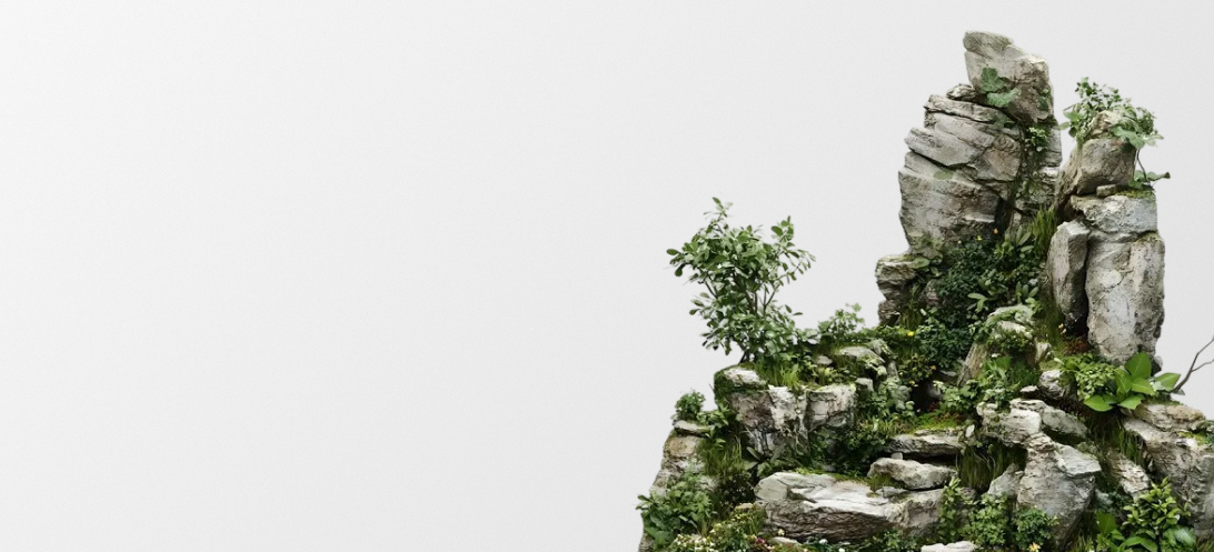Rock formation with greenery on a white background